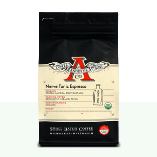 Nerve Tonic Espresso bag by Anodyne Coffee Roasting Co with vintage cream label and organic badge on a black pouch