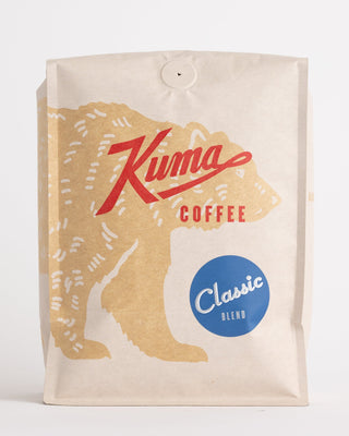 Kuma Coffee Classic Blend bag with bold red logo and blue Classic Blend badge