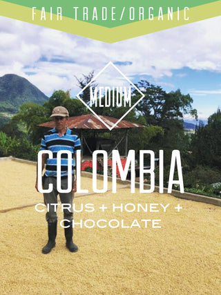 Colombia Organic Fair Trade coffee label featuring a farmer beside sun dried parchment in the highlands