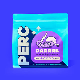 DARRRK Dark Fruity Espresso coffee bag with bold cartoon art on a bright blue package