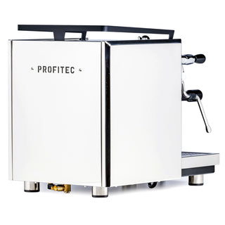 Side view of a chrome Profitec Drive espresso machine with a dark top handle and visible PROFITEC branding on the side.