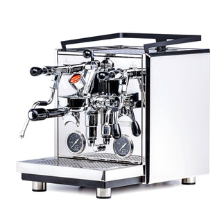 Profitec DRIVE dual boiler espresso machine with twin group heads and chrome finish, visible gauges and portafilters