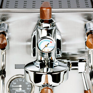 Front view of the Profitec JUMP with a central wooden knob and chrome controls and a pressure gauge