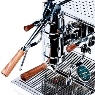 Profitec Pro 800 lever espresso machine close-up with wooden handles and chrome fittings.