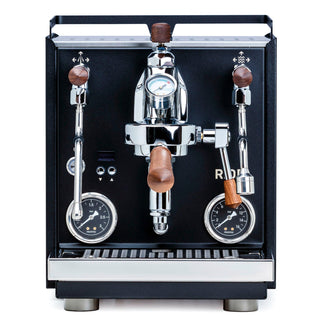 Left side close up of Profitec RIDE showing wooden portafilter handles and chrome fittings.