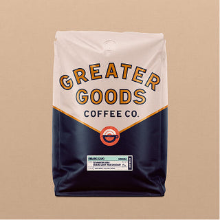 Greater Goods Ribang Gayo coffee bag in white and navy packaging standing upright