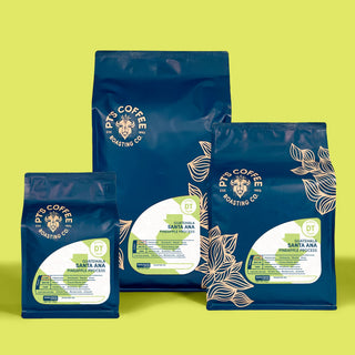 Guatemala Santa Ana Pineapple Process coffee bags arranged on a bright yellow background
