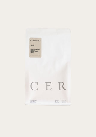 White Ceremony Coffee Roasters bag for Thesis with a beige tasting notes label