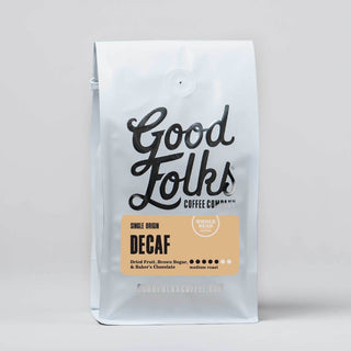 Good Folks Coffee Colombia Sugar Cane Process decaf bag with orange DECAF label and whole bean badge
