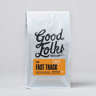 Good Folks Coffee Fast Track espresso bag with orange label and whole bean badge