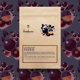 Demitasse Cold Brew Blend bag with abstract geometric artwork and blue orange accents