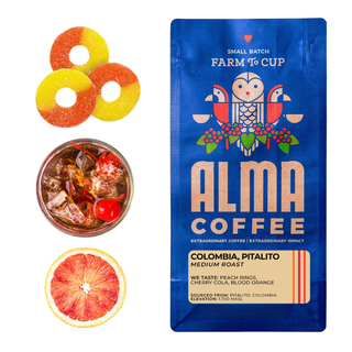 Colombia Pitalito coffee with three donuts a jar of jam and a grapefruit half beside a blue Alma Coffee bag
