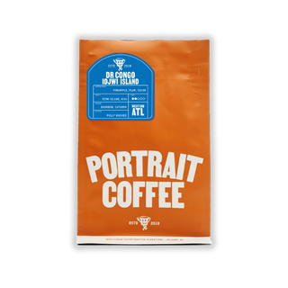 Orange Portrait Coffee bag with blue Congo Idjwi Island Washed label and bold branding