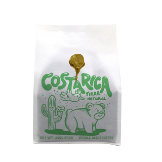 Costa Rica Tirra Natural whole bean coffee bag with bright green wildlife artwork