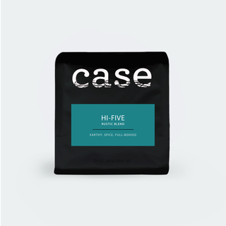 Hi-Five Blend coffee bag featuring a teal label on a dark package.