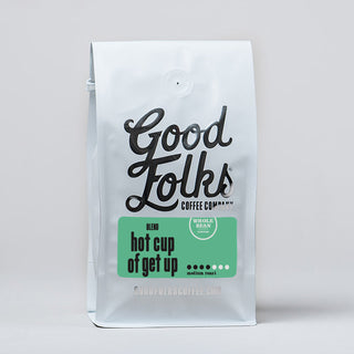 White Good Folks Coffee bag labeled hot cup of get up with a green roast label