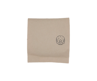 Kraft coffee bag with small black skull graphic in the corner