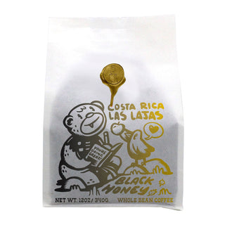Costa Rica Las Lajas Black Honey coffee bag with an illustrated bear design.