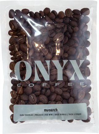 Monarch coffee beans in a clear bag with bold ONYX logo across the front