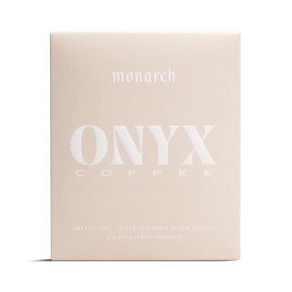 Monarch coffee box in pale beige with large white ONYX COFFEE branding