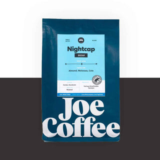 Nightcap Decaf coffee bag with blue label and bold Joe Coffee typography