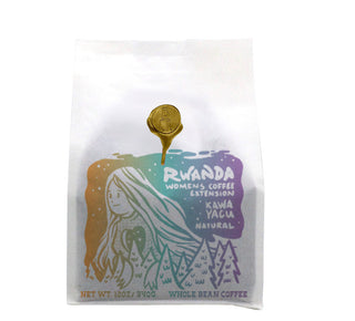 White Rwanda Women’s Coffee Extension bag with rainbow illustration and gold seal reading Kawa Yacu Natural