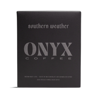 Dark grey Southern Weather box with Onyx Coffee branding and a large ONYX COFFEE logo