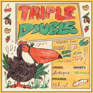 Close-up of the Triple Double illustrated label with bold red and green lettering and a toucan.