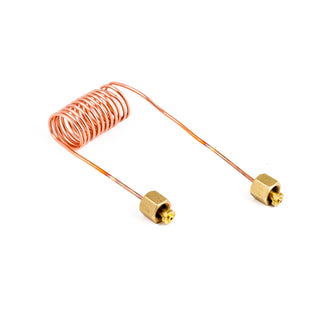 Coiled copper capillary tube with brass fittings used to connect pressure to the ECM boiler steam gauge