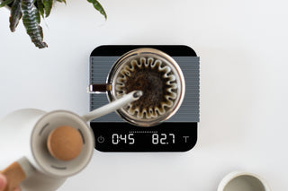 Acaia Pearl Scale in pitch black displaying weight to the tenth of a gram, Clive Coffee - Lifestyle Large