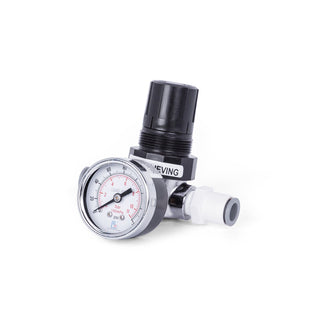 Pressure regulator with gauge and black knurled top.